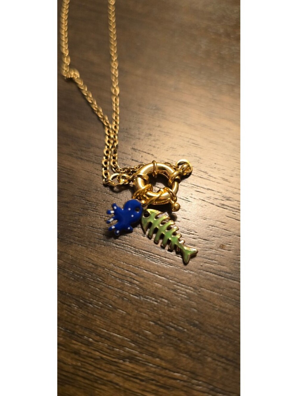 Gold Tone Necklace with Blue Octopus and Green Fishbone Charms